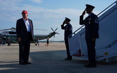 US President Donald Trump boards Air Force One for a trip to visit a new migrant detention center in Ochopee, Florida, Tuesday, July 1, 2025, in Andrews Air Force Base, Md. (AP Photo/Evan Vucci)