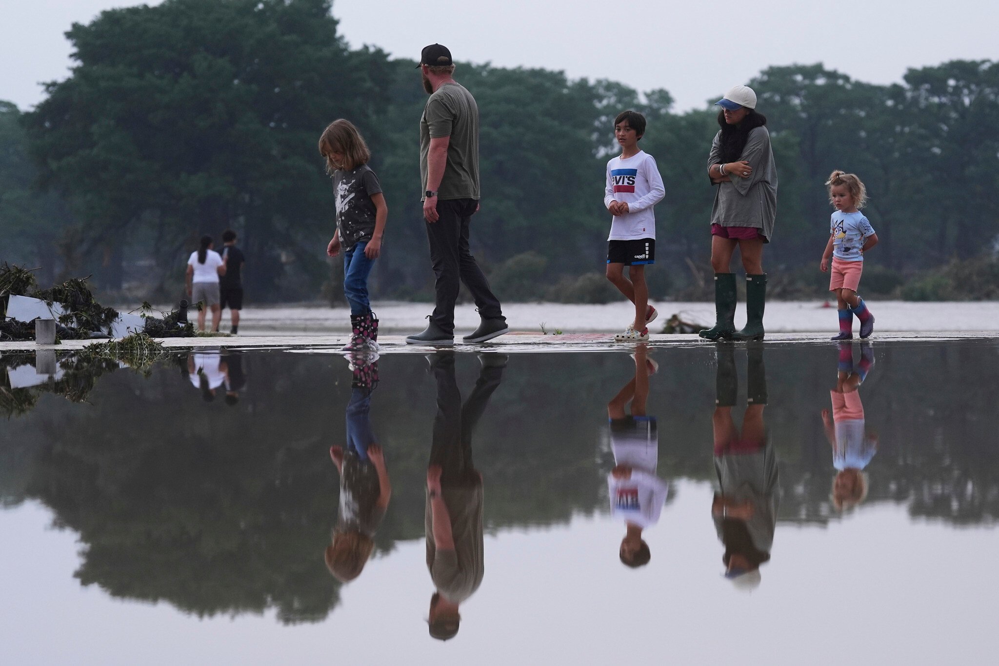NextImg:Texas flood kills 24; frantic searches for more than 20 missing girls at summer camp