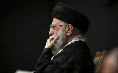 In this photo provided by the Office of the Iranian Supreme Leader, Supreme Leader Ayatollah Ali Khamenei attends the "Tasua" (ninth day) mourning ritual to commemorate martyrdom of Prophet Mohammad's grandson Imam Hussein, during the Islamic month of Muharram ahead of Ashura, July 5, 2025. (Office of the Iranian Supreme Leader via AP)