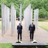 Mayor of London Sadiq Khan, left, and Prime Minister Keir Starmer lay a wreath at the 7/7 Memorial, in Hyde Park to mark the anniversary of the terrorist attacks in London on July 7, 2005, that killed 52 people, in London, July 7, 2025. (Stefan Rousseau/PA via AP)