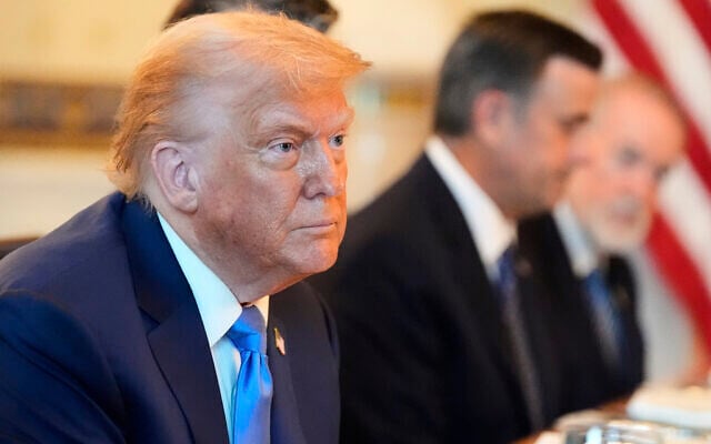 US President Donald Trump attends a meeting with Prime Minister Benjamin Netanyahu in the Blue Room of the White House, on July 7, 2025, in Washington. (AP Photo/Alex Brandon)