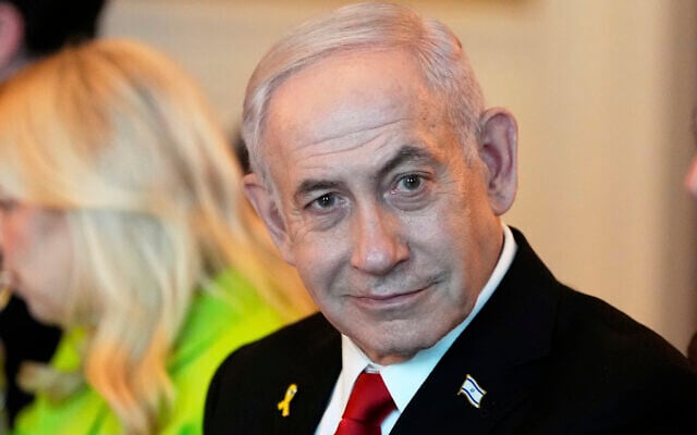 Prime Minister Benjamin Netanyahu attends a meeting with US President Donald Trump (not pictured) in the Blue Room of the White House, on July 7, 2025, in Washington. (AP Photo/Alex Brandon)