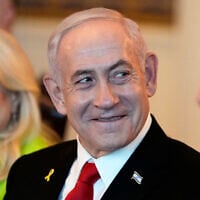 Prime Minister Benjamin Netanyahu attends a meeting with US President Donald Trump (not in picture) in the Blue Room of the White House in Washington, July 7, 2025. (AP Photo/Alex Brandon)