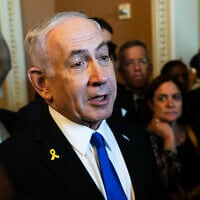Prime Minister Benjamin Netanyahu speaks to reporters before a meeting with lawmakers at the Capitol in Washington, July 9, 2025. (AP Photo/Manuel Balce Ceneta)