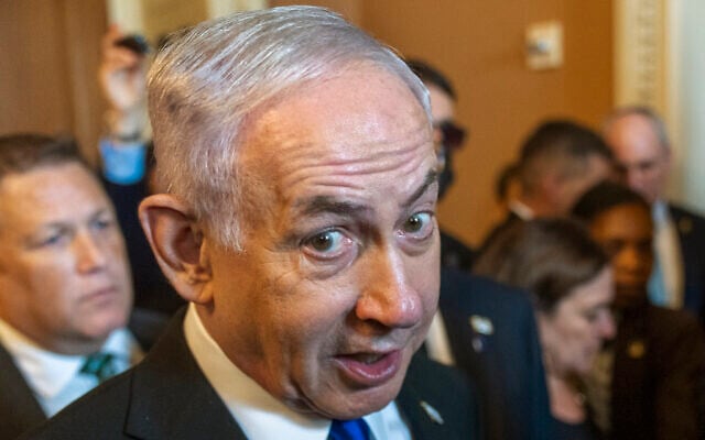 Prime Minister Benjamin Netanyahu speaks to reporters before a meeting with American lawmakers at the US Capitol in Washington, July 9, 2025. (AP Photo/Manuel Balce Ceneta)