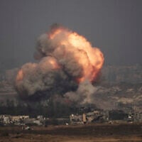 Smoke and fire rise to the sky following an IDF strike in the northern Gaza Strip, as seen from southern Israel, July 10, 2025. (AP Photo/Leo Correa)