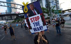 Relatives of hostages held by Hamas in the Gaza Strip and their supporters call for an immediate hostage release deal during a protest in Tel Aviv, Israel, July 10, 2025. (AP Photo/Ariel Schalit)
