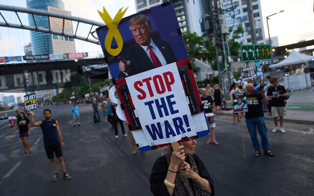 Relatives of hostages held by Hamas in the Gaza Strip and their supporters call for an immediate hostage release deal during a protest in Tel Aviv, Israel, July 10, 2025. (AP Photo/Ariel Schalit)