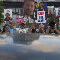 Relatives of hostages held by Hamas in the Gaza Strip and their supporters call for an immediate hostage release deal during a protest in Tel Aviv, Israel, July 10, 2025. (AP/Ariel Schalit)