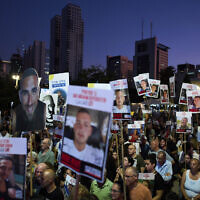 Relatives and supporters of Israeli hostages held in the Gaza Strip attend a rally demanding their release from Hamas captivity and calling for an end to the war, in Tel Aviv, Israel, July 12, 2025. (AP Photo/Oded Balilty)