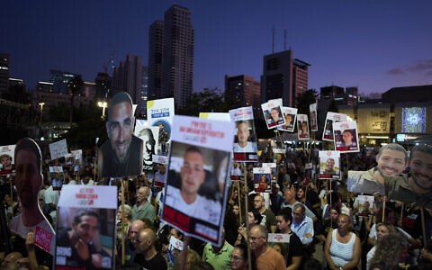 Relatives and supporters of Israeli hostages held in the Gaza Strip attend a rally demanding their release from Hamas captivity and calling for an end to the war, in Tel Aviv, Israel, July 12, 2025. (AP Photo/Oded Balilty)