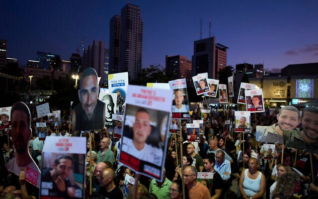 Relatives and supporters of Israeli hostages held in the Gaza Strip attend a rally demanding their release from Hamas captivity and calling for an end to the war, in Tel Aviv, Israel, July 12, 2025. (AP Photo/Oded Balilty)