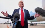 US President Donald Trump speaks to the media, July 13, 2025, on arrival to Joint Base Andrews, Maryland, en route to Washington, after attending the Club World Cup final soccer match in New Jersey. (AP Photo/Jacquelyn Martin)