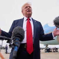 US President Donald Trump speaks to the media, July 13, 2025, on arrival to Joint Base Andrews, Maryland, en route to Washington, after attending the Club World Cup final soccer match in New Jersey. (AP Photo/Jacquelyn Martin)