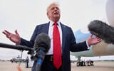 US President Donald Trump speaks to the media on arrival at Joint Base Andrews, Maryland, en route to Washington, after attending the Club World Cup final soccer match in New Jersey, July 13, 2025. (AP Photo/Jacquelyn Martin)