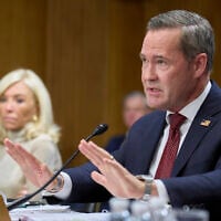 Christine Toretti, left, nominee for U.S. Ambassador to Sweden, listens as former White House National Security Adviser Michael Waltz, testifies during a Senate Foreign Relations Committee nomination hearing on his nomination to be US Representative to the United Nations, Tuesday, July 15, 2025, on Capitol Hill in Washington. (AP Photo/Jacquelyn Martin)