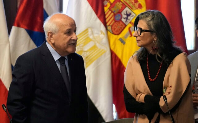 Riyad Mansour, Palestinian Authority ambassador to the UN, left, and UN special rapporteur on Palestinian rights Francesca Albanese, attend a two-day conference to address the Israel-Hamas war and Israeli military actions in Gaza, in Bogota, Colombia, July 15, 2025. (AP Photo/Fernando Vergara)