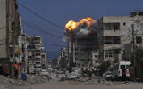 Smoke and flames erupt from an Israeli airstrike in Gaza City, July 21, 2025. (Jehad Alshrafi/AP)