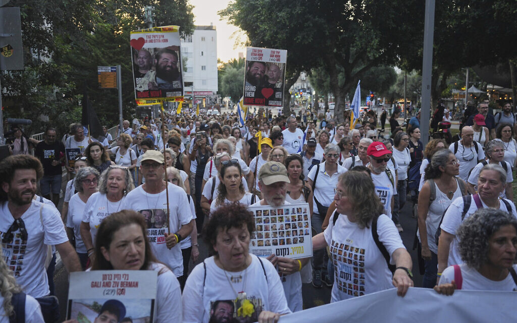 People attend a rally calling for the end of the war and the immediate release of hostages held by Hamas in the Gaza Strip, in Tel Aviv, Israel, Thursday, July 24, 2025. (AP/Ariel Schalit)
