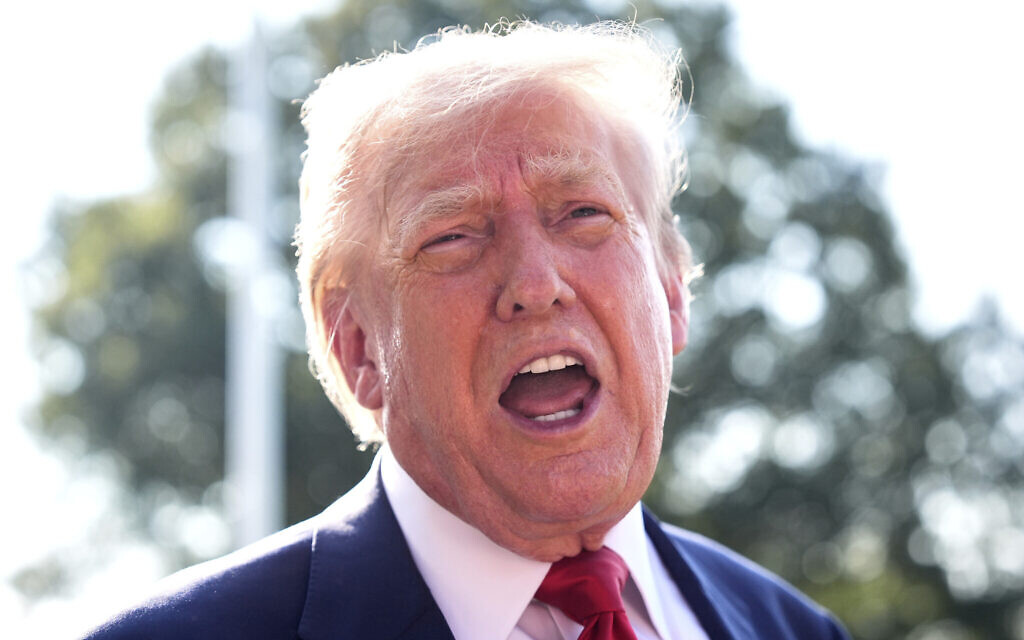 US President Donald Trump speaks with reporters before departing on Marine One from the South Lawn of the White House, July 25, 2025, in Washington. (AP/Alex Brandon)