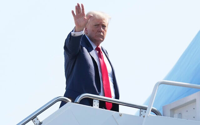 US President Donald Trump waves as he boards Air Force One at Joint Base Andrews, Maryland, July 25, 2025, en route to Scotland. (AP/Jacquelyn Martin)