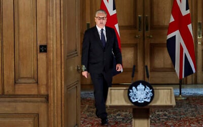 Britain's Prime Minister Keir Starmer delivers a statement inside No. 10 Downing Street after the cabinet was recalled to discuss the situation in Gaza, in London, July 29, 2025. (Toby Melville, Pool Photo via AP)