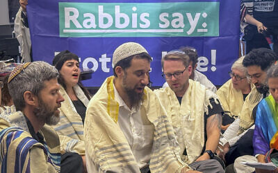 A group of Jewish clergy sit-in at the office of Senate Majority Leader John Thune to bring attention to the situation in Gaza, July 29, 2025, at the Capitol in Washington. (Sue Dorfman via AP)