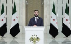 Syrian interim President Ahmad al-Sharaa speaks in a recorded statement released early on July 17, 2025, following  clashes and Israeli strikes in the Druze-majority province of Sweida. (Telegram screenshot)