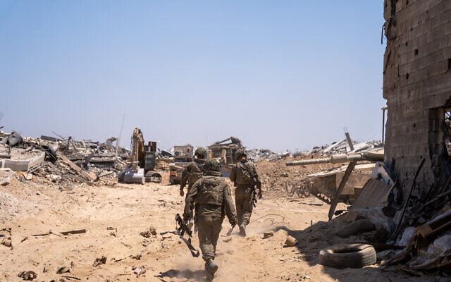 IDF troops are seen on the outskirts of Gaza City's Daraj and Tuffah neighborhoods, July 23, 2025. (Emanuel Fabian/ Times of Israel)
