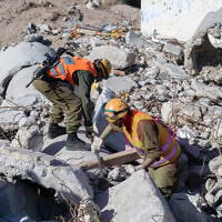 Members of the Knesset Honor Guard, Home Front Command, firefighters, IDF and Israel's Magen David Adom emergency medical services participate in an emergency drill simulating an earthquake near Ashkelon, on December 19, 2019. (Yaniv Nadav/Flash90)