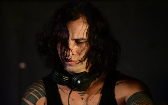 Israeli DJ Skazi performs at a protest against the government and the government's new restrictions following the spread of the coronavirus in Tel Aviv on July 25, 2020. (Tomer Neuberg/Flash90)