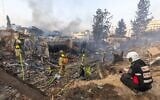 Israeli security and rescue forces at the scene where a ballistic missile fired from Iran hit and caused damage in Rehovot, June 15, 2025. (Yossi Aloni/Flash90)