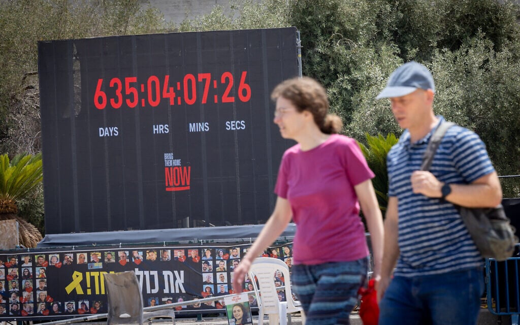 A digital countdown marks the time that has passed since the hostages were abducted during the October 7, 2023, onslaught, at Tel Aviv's Hostage Square, July 3, 2025. (Miriam Alster/Flash90)
