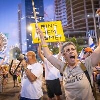Demonstrators in Tel Aviv protest against the Israeli government and for the release of Israelis held hostage in the Gaza Strip, July 5, 2025. (Miriam Alster/Flash90)