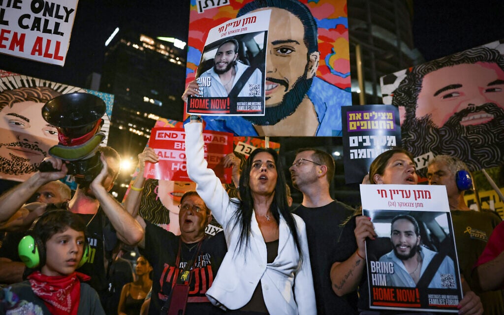 Einav Zangauker, mother of hostage Matan Zangauker, stands with protesters demanding a hostage deal, Tel Aviv, July 5, 2025. (Miriam Alster/Flash90)