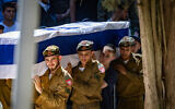 Family and friends of slain soldier Staff Sgt. Moshe Shmuel Noll attend his funeral at the Mount Herzl Military Cemetery in Jerusalem on July 9, 2025. (Chaim Goldberg/Flash90)