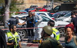 Soldiers and rescue officials at the scene of a terror attack at a shopping complex at Gush Etzion Junction, in the West Bank, on July 10, 2025. (Yonatan Sindel/Flash90)