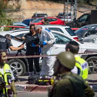 Soldiers and rescue officials at the scene of a terror attack at a shopping complex at Gush Etzion Junction, in the West Bank, on July 10, 2025. (Yonatan Sindel/Flash90)