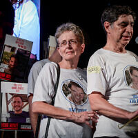 Leah Goldin, left, and Simcha Goldin, the parents of Israeli soldier Hadar Goldin whose body is held by Hamas in Gaza, attend a Tel Aviv rally calling for the release of hostages on July 12, 2025. (Avshalom Sassoni/Flash90)