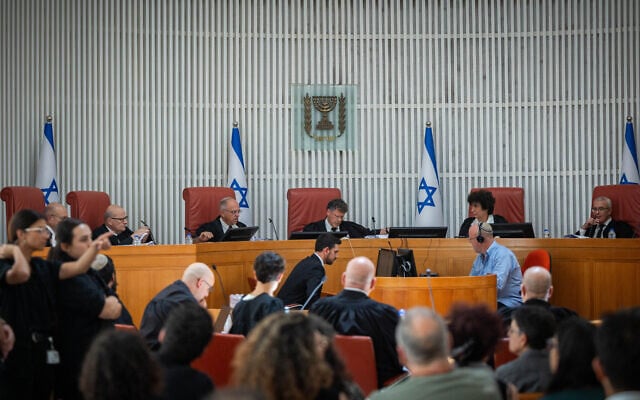 Supreme Court President Isaac Amit and six other judges hear petitions against a law enabling the government to shutter foreign media outlets in Israel, such as Al Jazeera, July 13, 2025. (Yonatan Sindel/ Flash90)