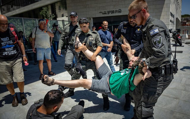 Israelis protest in support of Attorney General Gali Baharav-Miara outside the Justice Ministry in Jerusalem, July 14, 2025 (Noam Revkin Fenton/Flash90)
