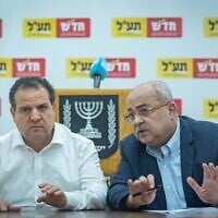 Hadash-Ta'al chair Ayman Odeh (left) and MK Ahmad Tibi lead a faction meeting at the Knesset, on July 14, 2025. (Yonatan Sindel/Flash90)
