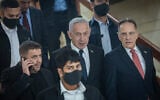Prime Minister Benjamin Netanyahu arrives at the Knesset, in Jerusalem, on July 14, 2025. (Yonatan Sindel/Flash90)