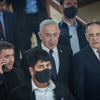 Prime Minister Benjamin Netanyahu arrives at the Knesset, in Jerusalem, on July 14, 2025. (Yonatan Sindel/Flash90)