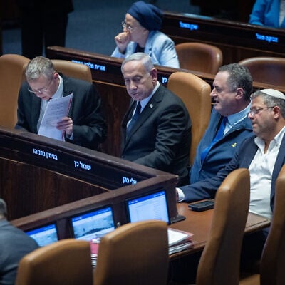 L to R: Justice Minister Yariv Levin, Prime Minister Benjamin Netanyahu, Defense Minister Israel Katz, and National Security Minister Itamar Ben Gvir are seen in the Knesset in Jerusalem, ahead of a failed vote on MK Ayman Odeh's proposed expulsion from the body. (Yonatan Sindel/Flash90)