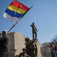 Druze residents protest near the Israel-Syria border fence in solidarity with their community in Syria, July 16, 2025. (Photo by Michael Giladi/Flash90)