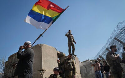 Druze residents protest near the Israel-Syria border fence in solidarity with their community in Syria, July 16, 2025. (Photo by Michael Giladi/Flash90)
