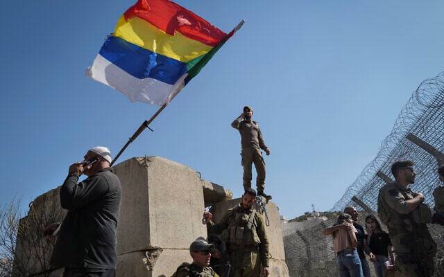 Druze residents protest near the Israel-Syria border fence in solidarity with their community in Syria, July 16, 2025. (Photo by Michael Giladi/Flash90)
