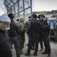 Soldiers guard the  Israeli-Syrian border as Druze residents on both sides of the frontier protest on July 16, 2025. (Michael Giladi/Flash90)
