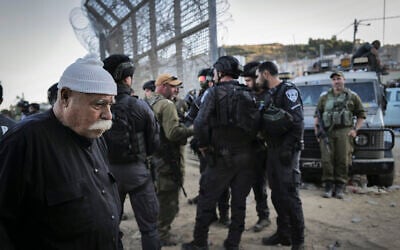 Soldiers guard the  Israeli-Syrian border as Druze residents on both sides of the frontier protest on July 16, 2025. (Michael Giladi/Flash90)